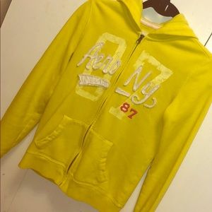 Nice yellow sweater.